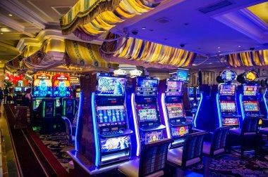 Mega Sevens slot game interface showing seven reels and payline display